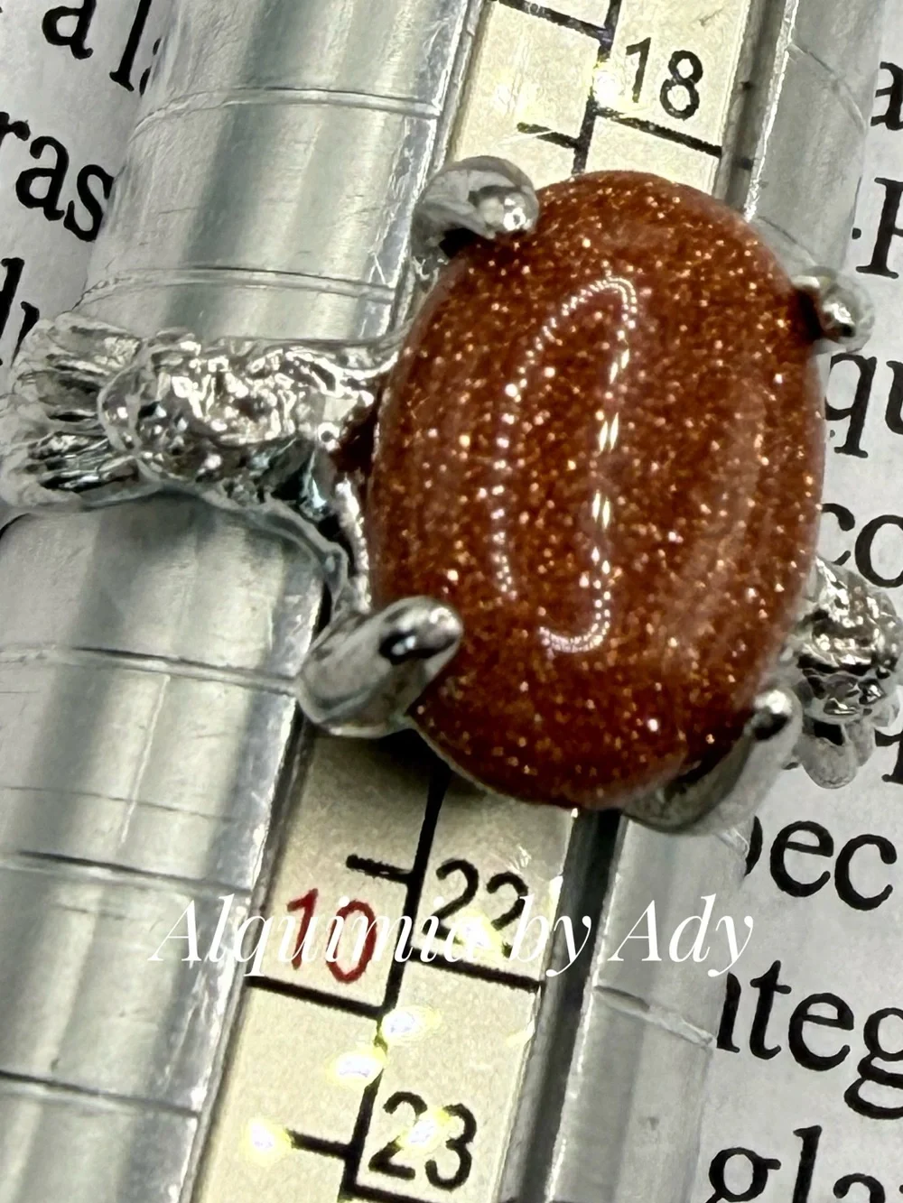 Sparkling Brown Goldstone Oval Ring in Silver-Tone Setting